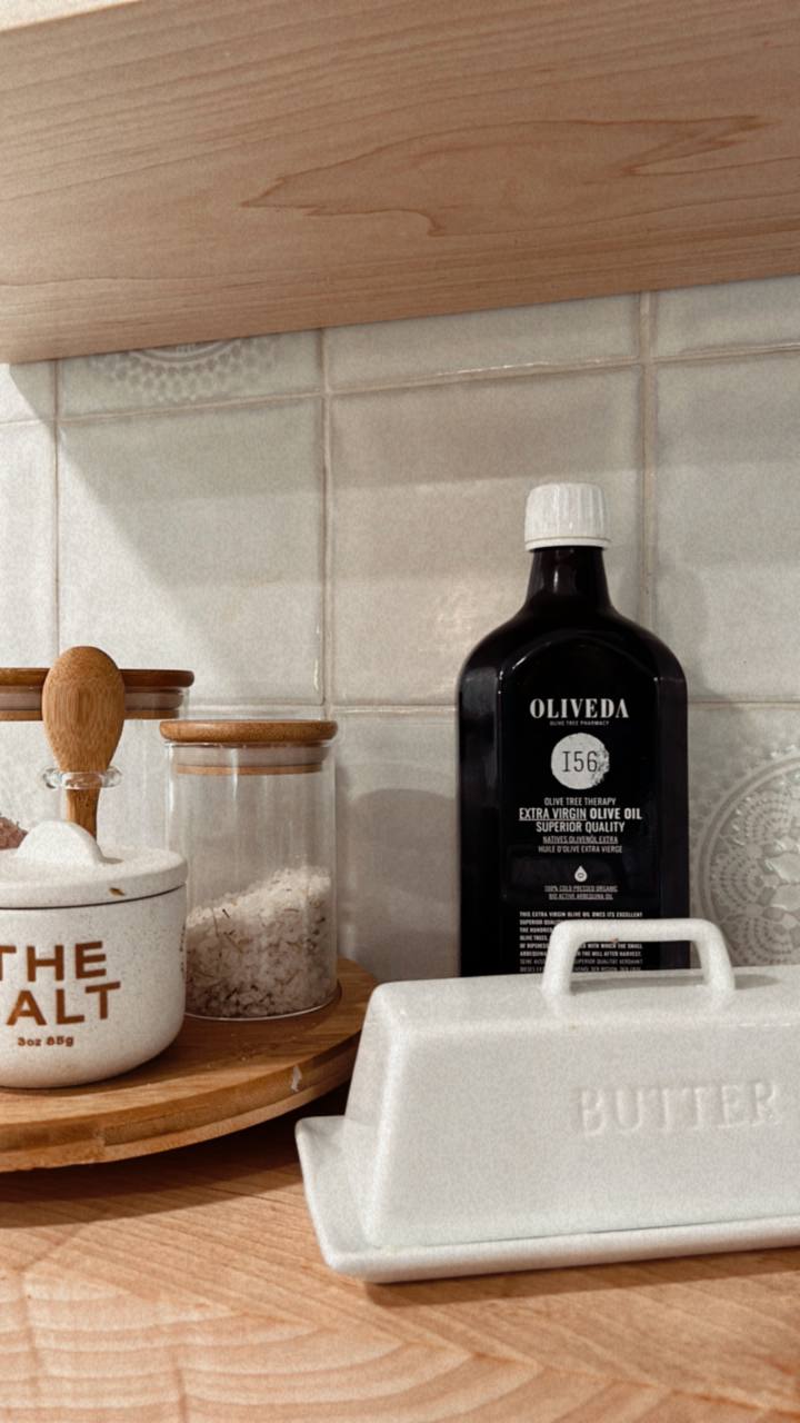 Oliveda olive oil in a warm kitchen setting